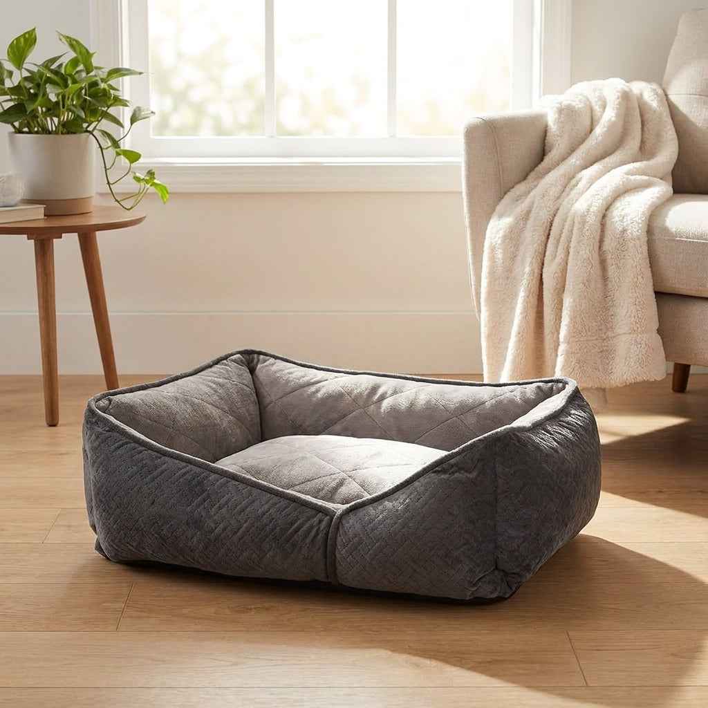 Gray flat orthopaedic dog bed with cushioned sides and inner quilted mattress