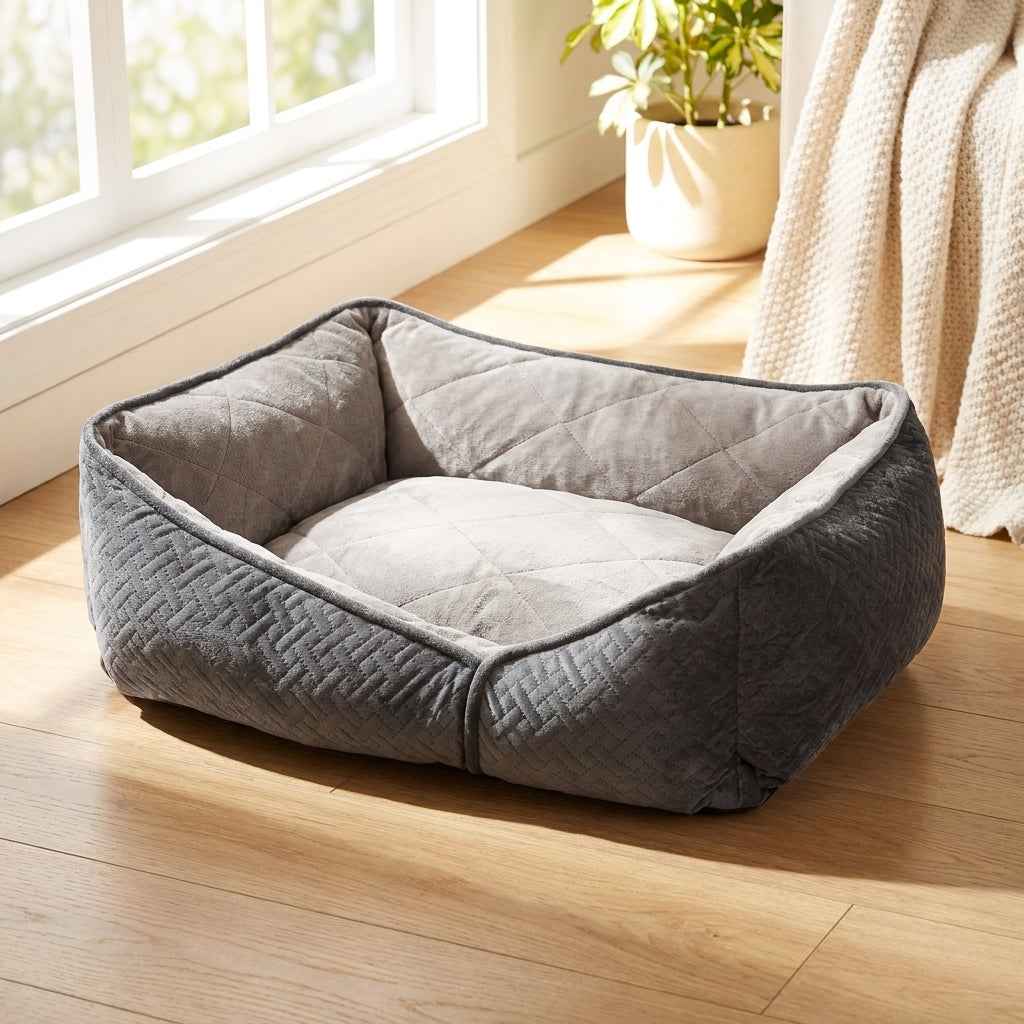 Gray flat orthopaedic dog bed with rounded corners and quilted padded edges