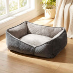 Gray flat orthopaedic dog bed with rounded corners and quilted padded edges