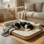 Waterproof dog bed mat with beige cushion and brown trim, dog lying on top.