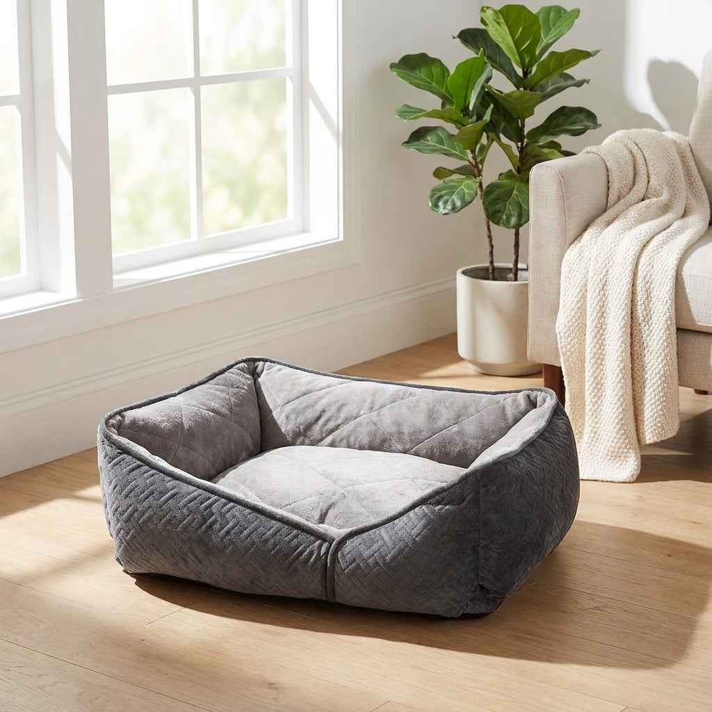 Gray flat orthopaedic dog bed with thick bolster sides and light gray center cushion